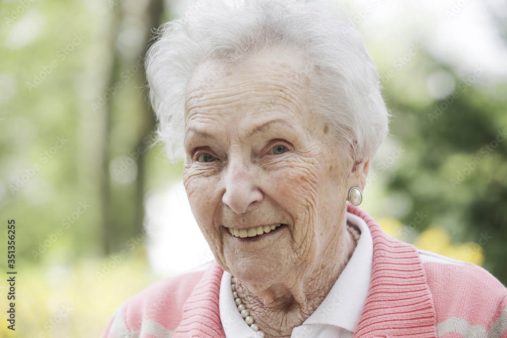 Germany, North Rhine Westphalia, Cologne, Portrait of senior woman, smiling, close up Germany, North Rhine Westphalia, Cologne, Portrait of senior woman, smiling, close up