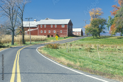 A red barn and scenic route 9G in the Hudson River Valley, NY