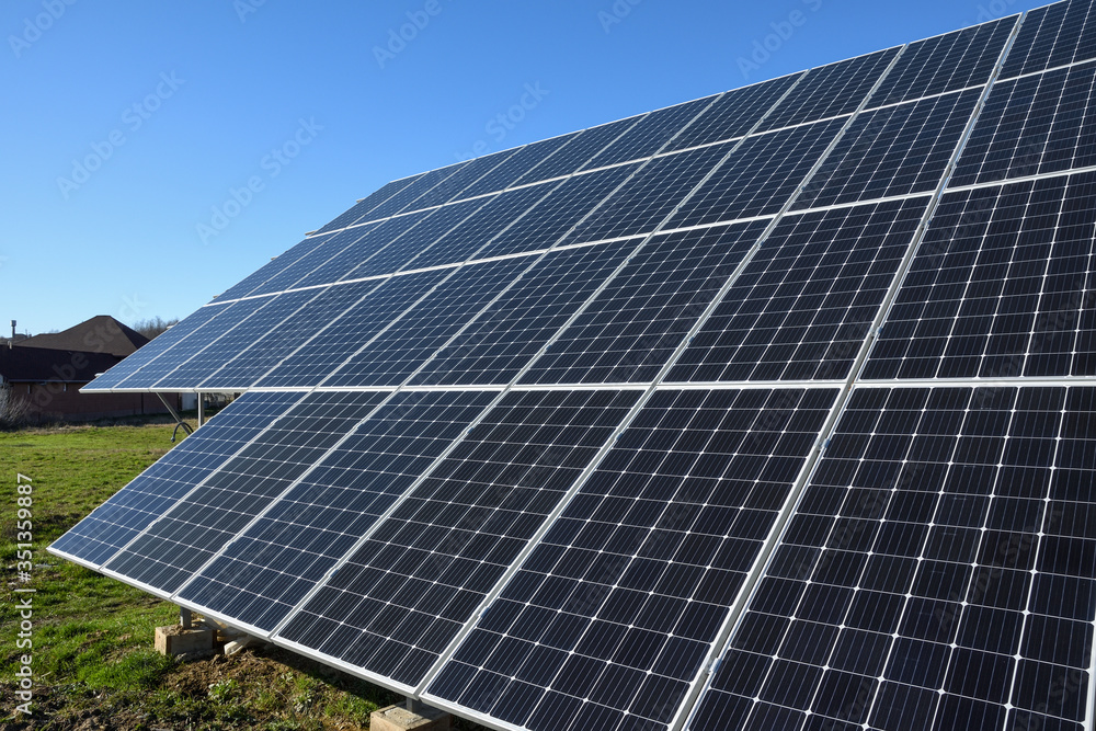 Solar panels against blue sky background.Against The Deep Blue Sky in suny weather Solar panels against blue sky background.Against The Deep Blue Sky in suny weather
