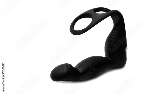 Black silicone prostate massager on white background. Anal plug.