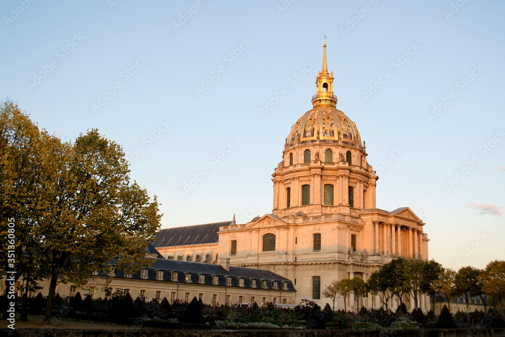 Les Invalides in Paris illuminated by the sun at sunset