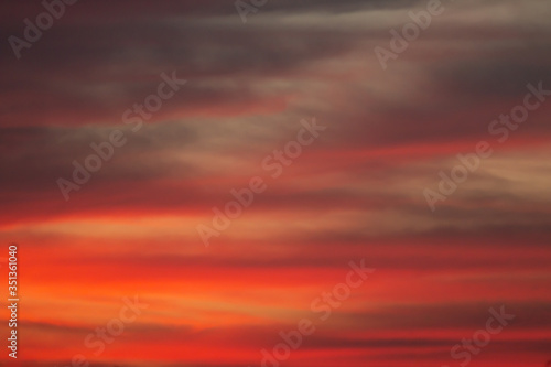Pink and red sky at sunset © milogrodskiy