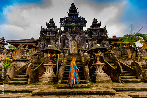 Woman at the Besakih Temple, the largest and holiest temple of Hindu religion in Bali, Indonesia, Southeast Asia, Asia photo