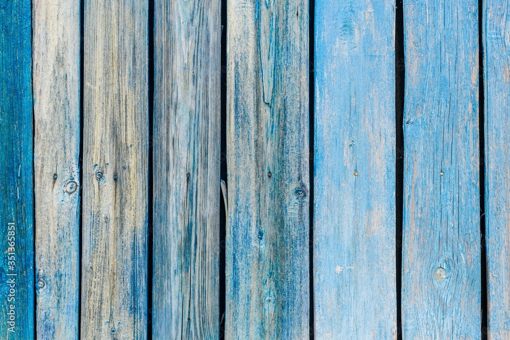 Background of blue wooden planks. Old wall. Background of blue wooden planks. Old wall.