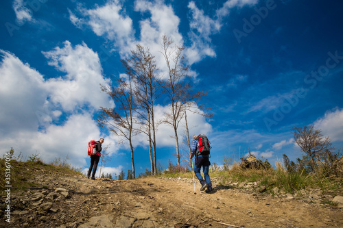 Tourists on mountain trekking Poland photo