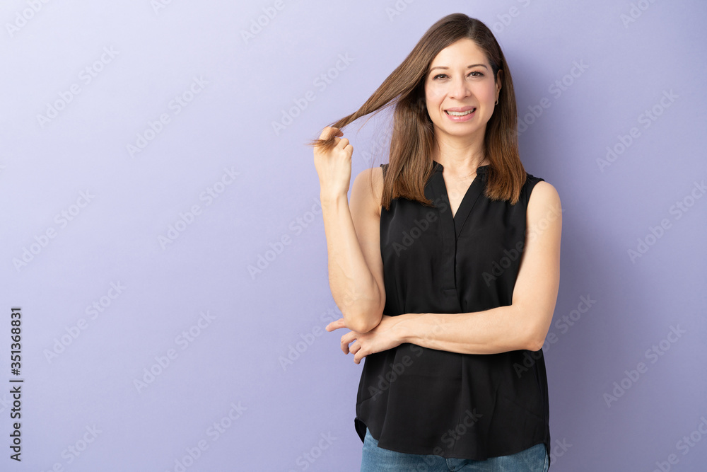Brunette woman showing off her hair