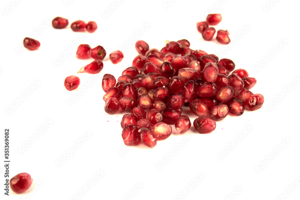 Juicy pomegranate fruit seeds Isolated on a white background. Seeds pomegranate Juicy pomegranate fruit seeds Isolated on a white background. Seeds pomegranate