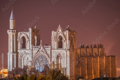 Famagusta city architecture at night in north Turkish Cyprus photo