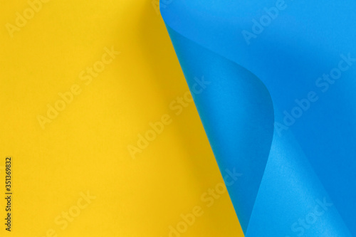 Abstract geometric shape pastel blue and yellow color paper background