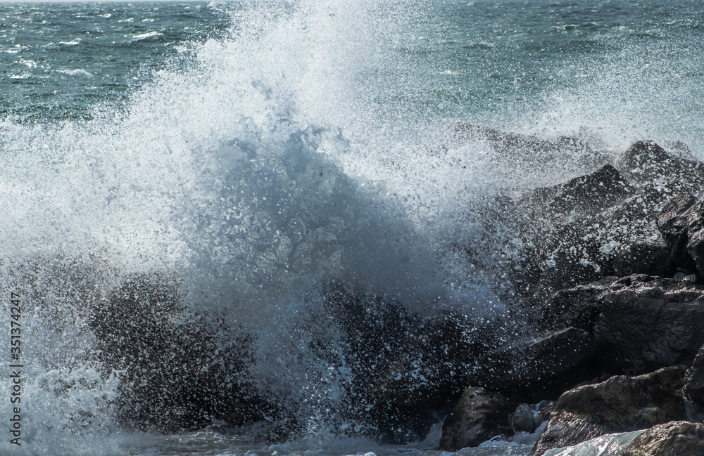 Naklejka premium splashing waves on the black sea