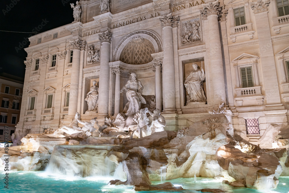 Fountain of Trevi by night, most famous Rome fountains in the world. Italy.