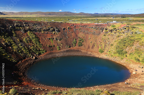 Autumn landscape of Kerid volcanic crater lake in Iceland, Europe