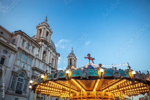 Ancient German Horse Carousel built in 1896 in Navona Square, Rome, Italy