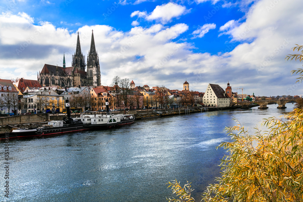 Beautiful towns of Germany - scenic medieval Regensburg over Danube river. Landmarks of Bavaria