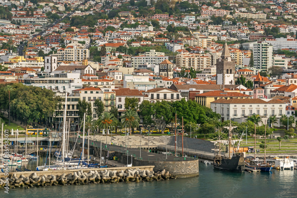 Cityscape of Funchal, Funchal bay and functional replica of Columbus' flagship Santa María in Madeira