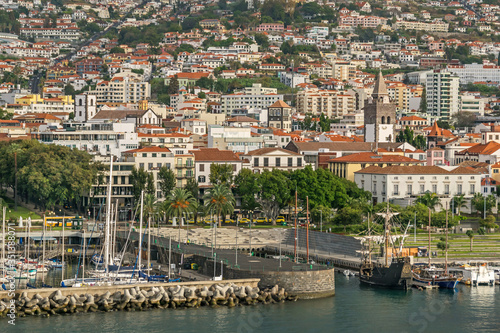 Cityscape of Funchal, Funchal bay and functional replica of Columbus' flagship Santa María in Madeira