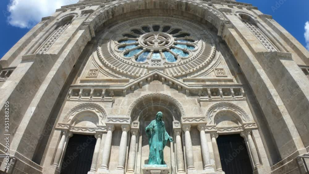 SLOW MOTION SHOT - The Monument Temple of Santa Luzia, dedicated to the Sacred Heart of Jesus in Viana do Castelo, Portugal. Its imposing rose windows are the largest in the Iberian Peninsula. SLOW MOTION SHOT - The Monument Temple of Santa Luzia, dedicated to the Sacred Heart of Jesus in Viana do Castelo, Portugal. Its imposing rose windows are the largest in the Iberian Peninsula.