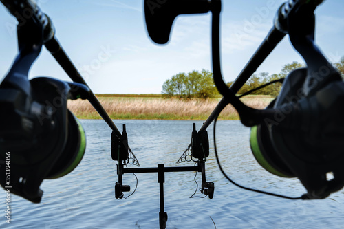 Fishing rods installed for fishing photo