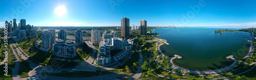 Photography Artistic creative view of Humber Bay Shores Park city view and green space with skyline cityscape, azure lake Ontario
