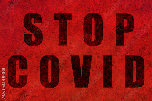 Stop covid design on a red textured background. Concept Stop covid-19.