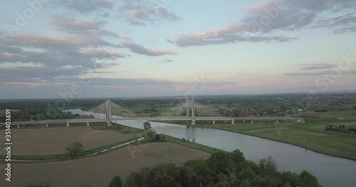 Bridge of Cardinal Franciszek Macharski in Krakow at sunset. photo