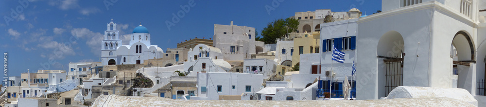 Fototapeta premium Panoramic view of Pyrgos village, Santorini island, Thira, Cyclades islands, Greece.
