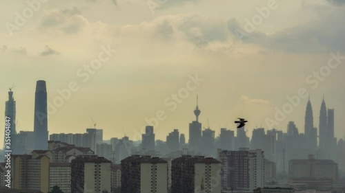 4K time lapse of monsoon clouds over down town Kuala Lumpur, Malaysia. 