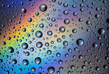 Water drops on a rainbow background