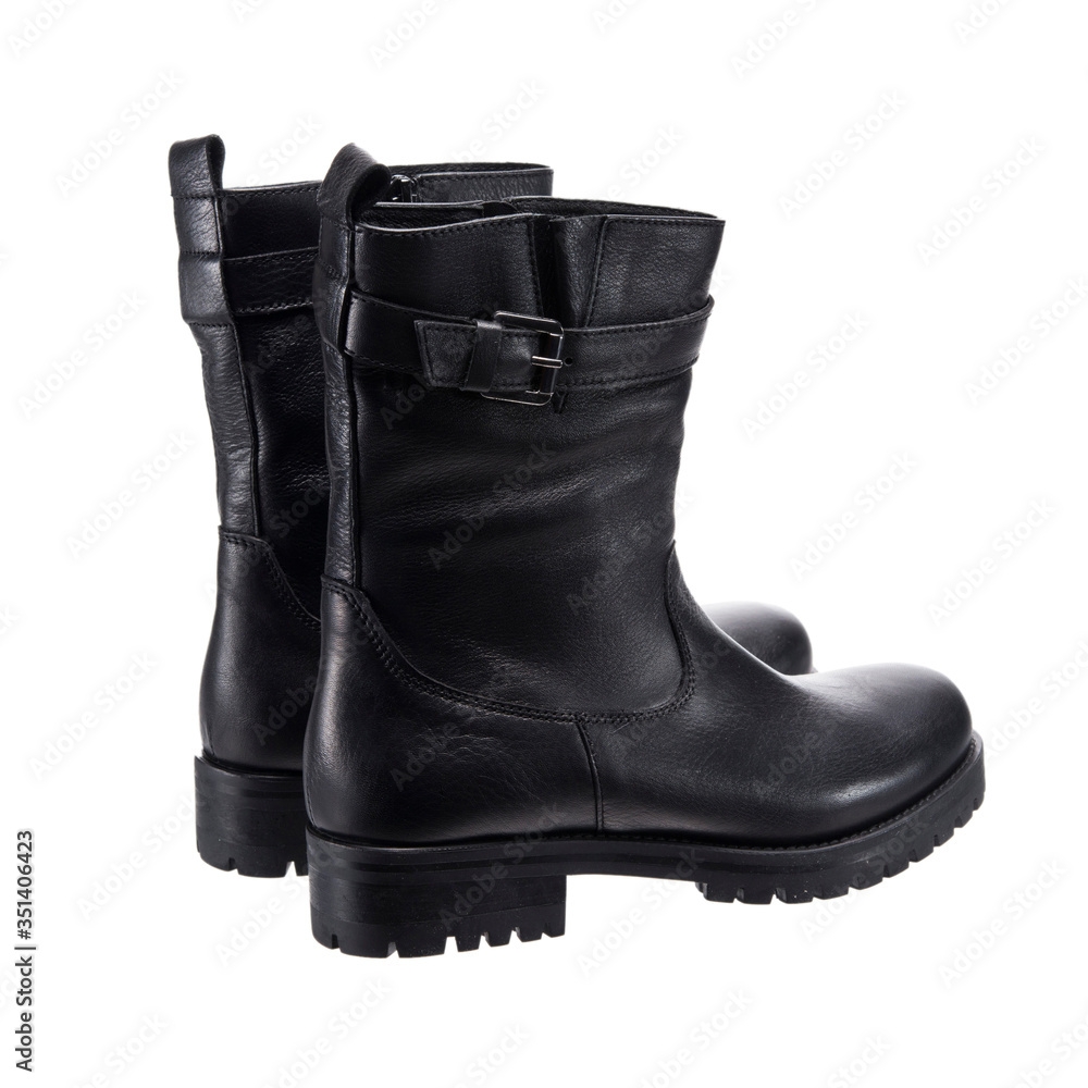 black semi leather female boots, object isolated on white background, clothing accessory