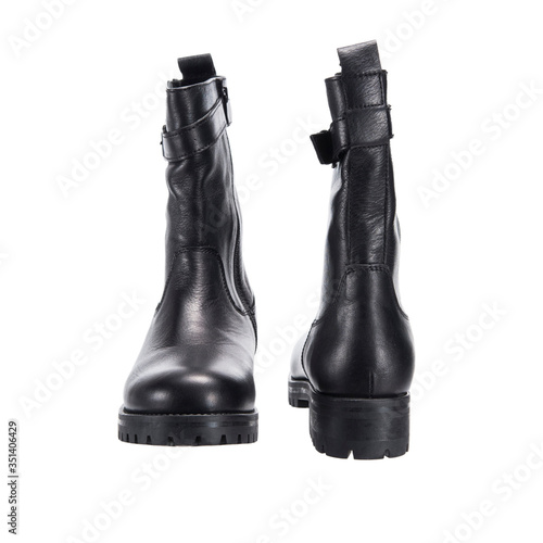 black semi leather female boots, object isolated on white background, clothing accessory