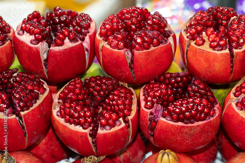 Thai fruit, Ripe Pomegranate, Pomegranate background, Tubtim is thai call, Some cuts in half to show the freshness, In Fruit Market