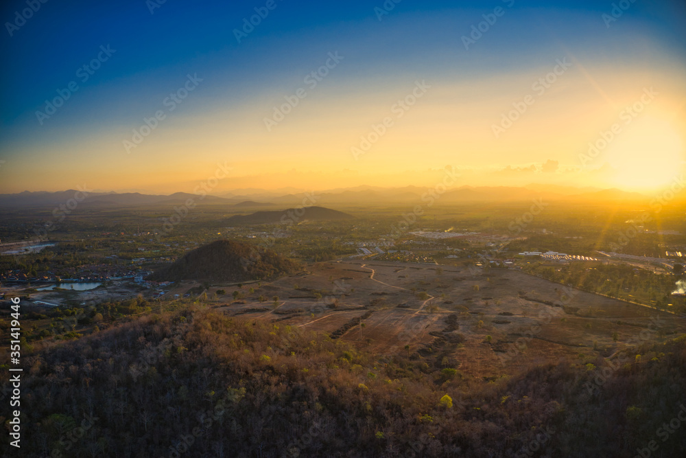 This unique photo shows the hilly landscape, from hua to thailand, taken with a drone by the evening sun during a wonderful sunset!
