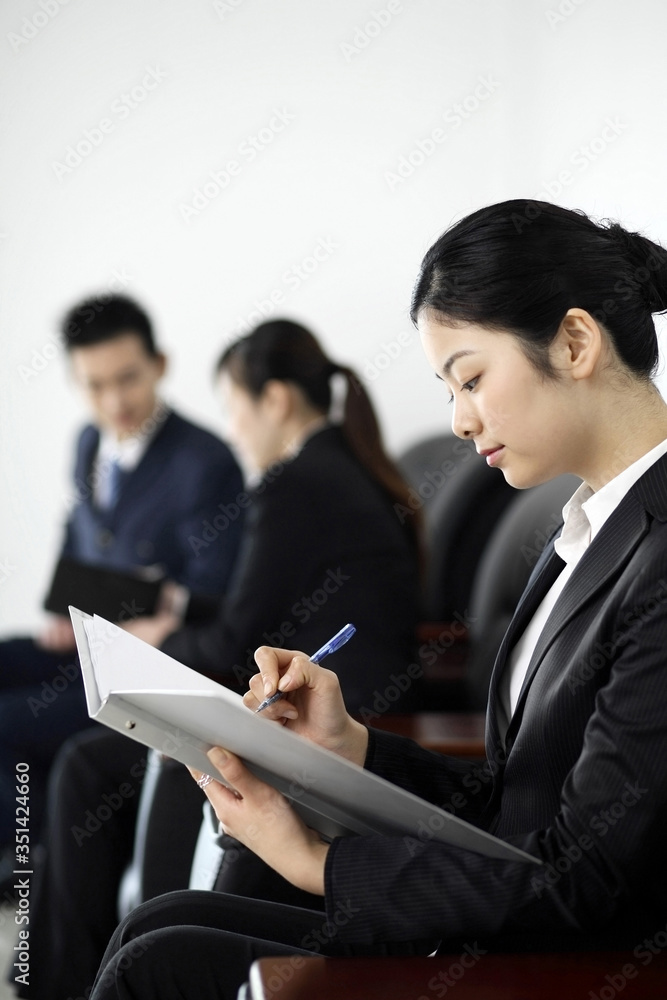 Businesswoman with pen and document Businesswoman with pen and document