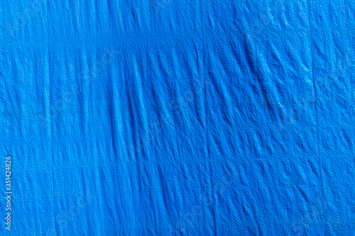 Wallpaper Mural texture of blue synthetic fabric with creases Torontodigital.ca