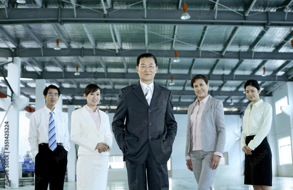 Business people posing for the camera Business people posing for the camera