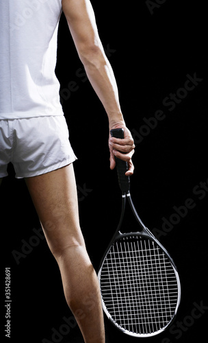 Man with a tennis racquet © ImageHit