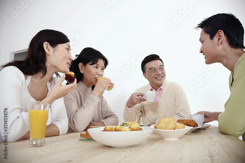 Family having breakfast together