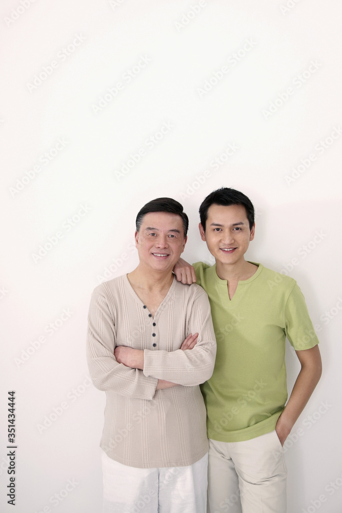 Senior man and man posing together Senior man and man posing together