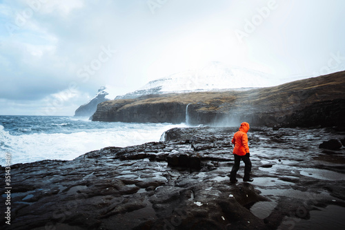 Stormy waves hitting the cliffs at Mølin beach in Streymoy island, Faroe Islands