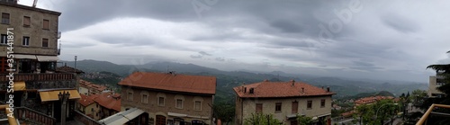Wallpaper Mural Panorama of San Marino. Top view of the city on a cloudy day. Torontodigital.ca