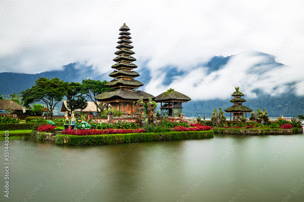 Pura Ulun Danu Bratan temple. Balinese landmark. Water reflection. Slow shutter speed. Bratan lake, Bali, Indonesia Pura Ulun Danu Bratan temple. Balinese landmark. Water reflection. Slow shutter speed. Bratan lake, Bali, Indonesia