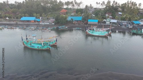 camera fly away from large boats water ridge Prancak Perancak west bali photo