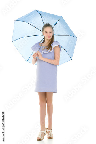 Beautiful Teen Girl Standing with Opened Umbrella