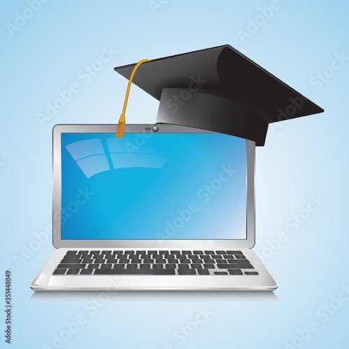 mortarboard and laptop
