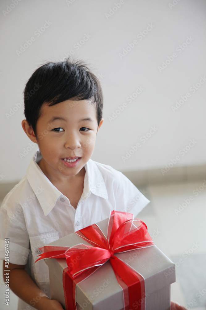 Boy with a box of gift Boy with a box of gift