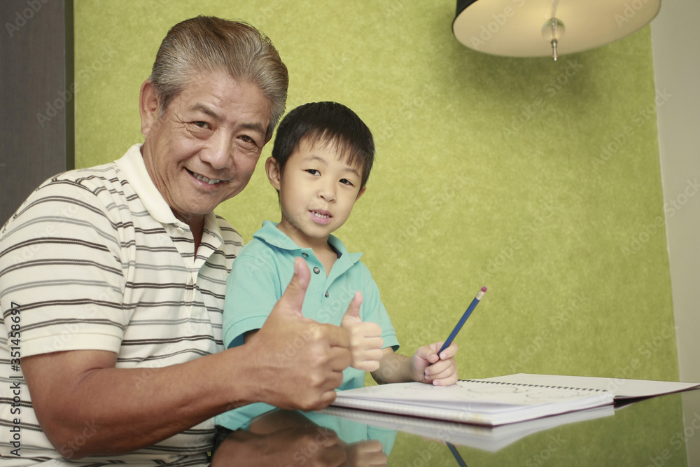 Man and boy showing thumbs up Man and boy showing thumbs up
