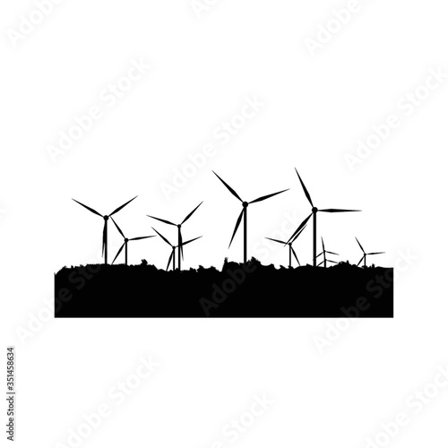 silhouette of windmills