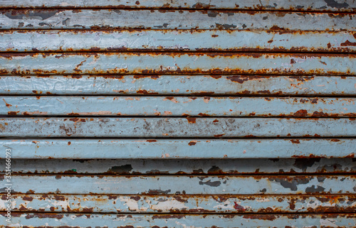 Rusty blue steel lined up