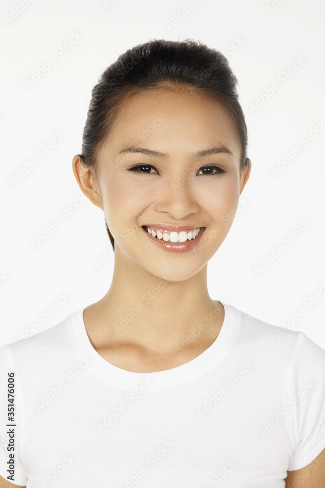 Happy woman smiling at the camera Happy woman smiling at the camera