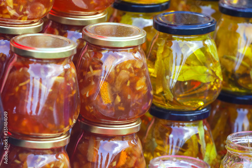 Yellow leaf jam in glass jars
